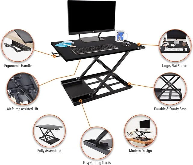 Stand Steady X-Elite Pro 28 pneumatic standing desk converter on a desk