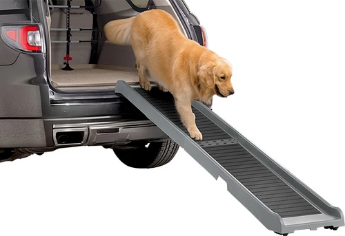 WeatherTech PetRamp with ribbed non-slip surface and dog walking down at SUV