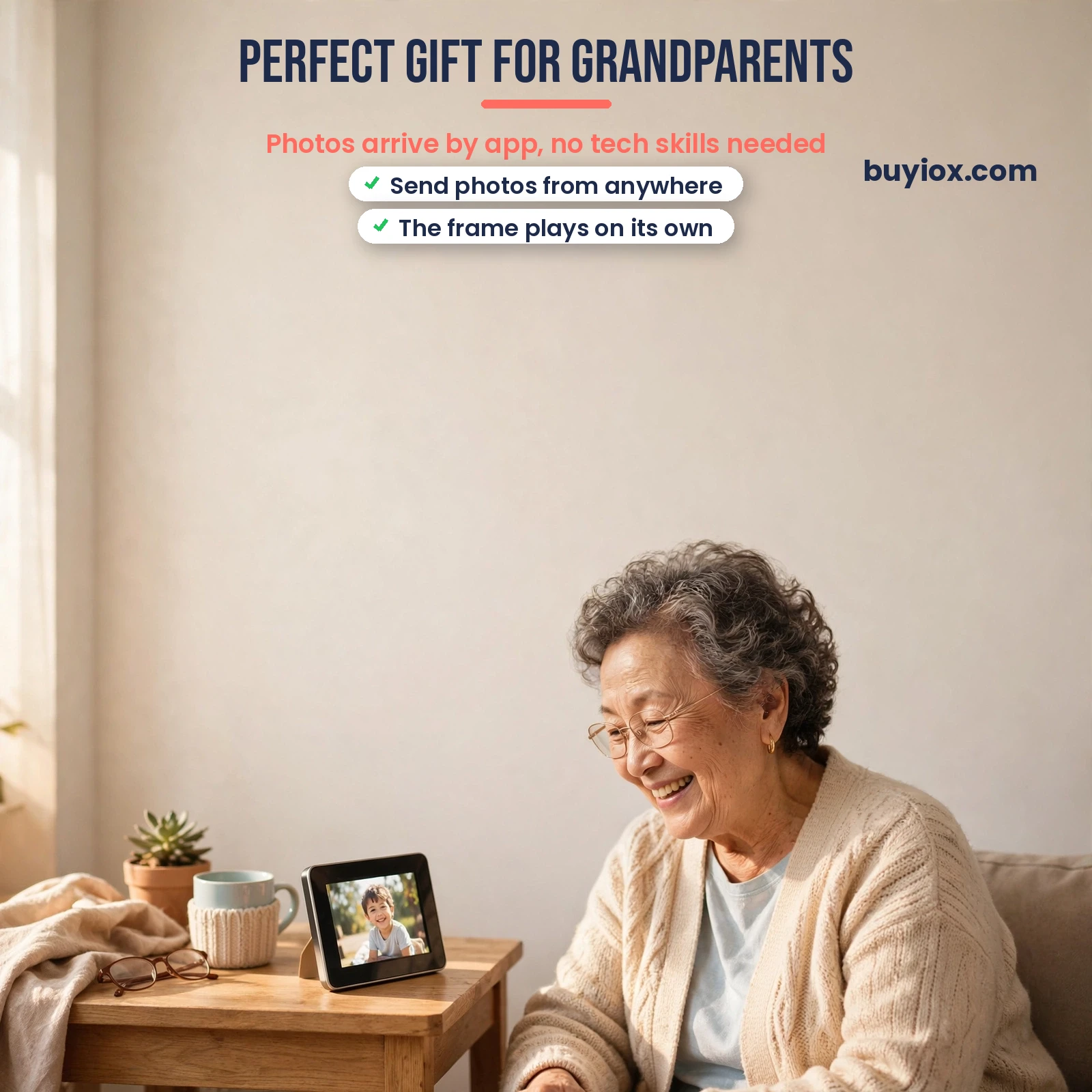 Grandmother smiling at a digital photo frame - best digital photo frame for grandparents
